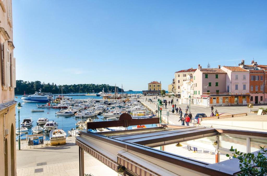 a view of a marina with boats in the water at Apartment Noemi in Rovinj