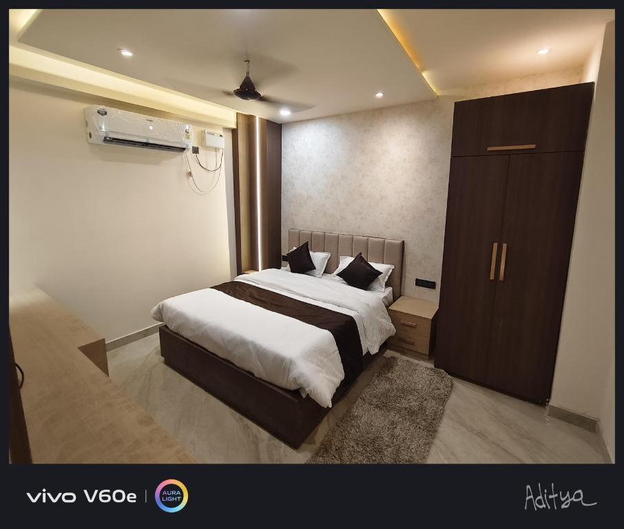 Llit o llits en una habitació de Hotel Townhouse