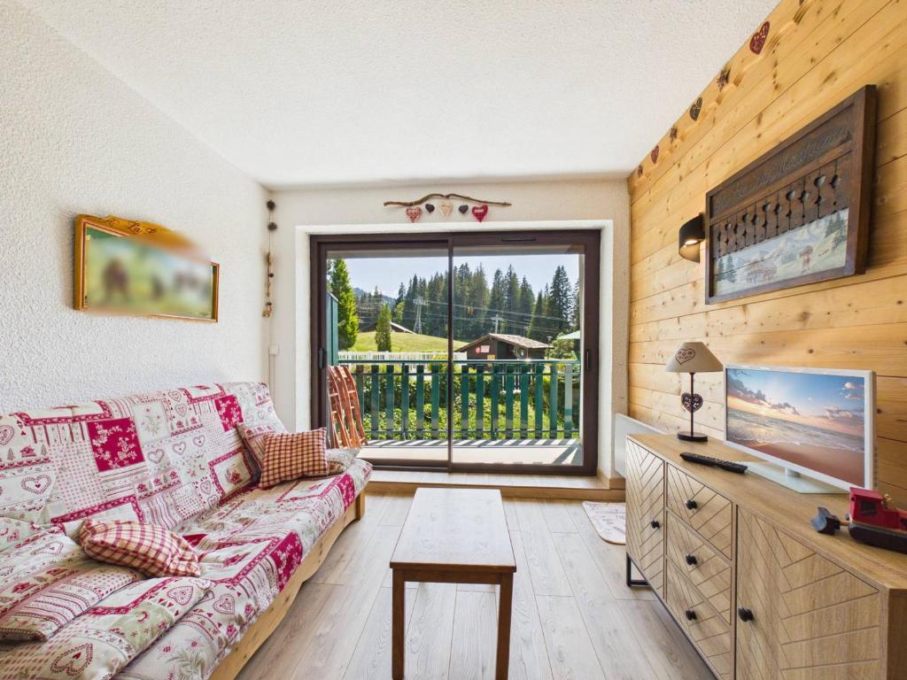 Appartement cosy aux pieds des pistes avec piscine et tennis, proche du centre des Gets