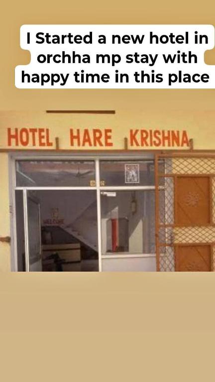 a sign that says i started a new hotel in ontario my stay with happy at Hare Krishna hotel in Orchha
