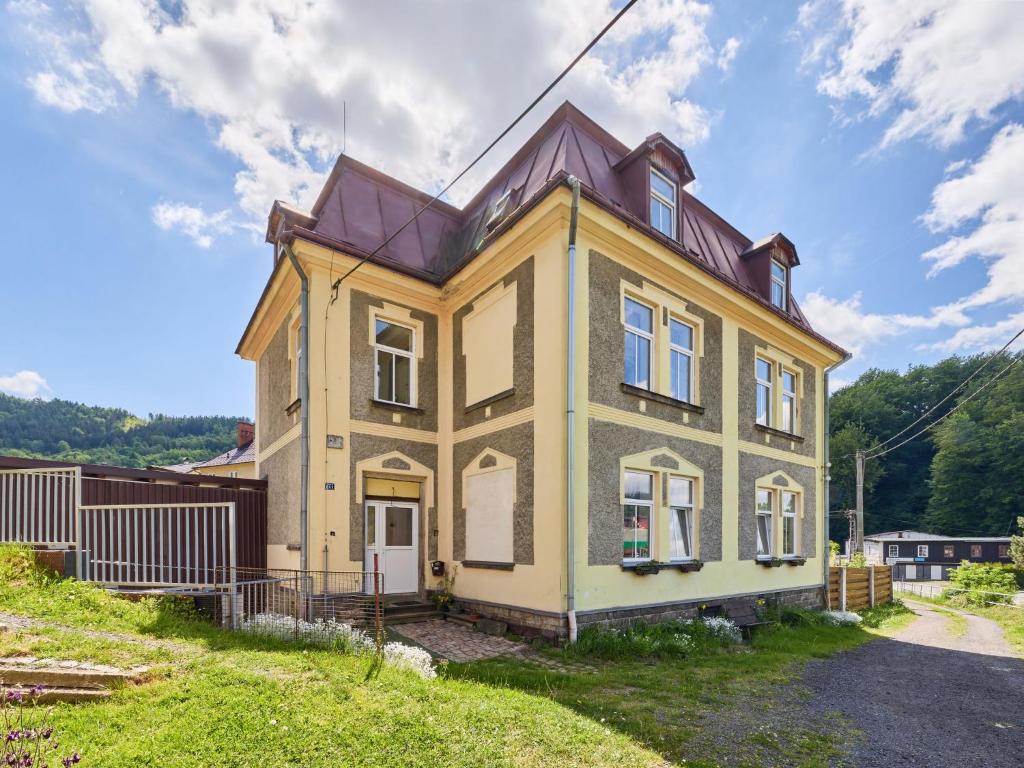 a house on the side of a hill at Apartment Riedlovka 2 by Interhome in Polubný