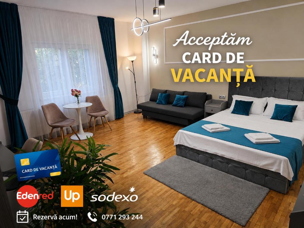 a hotel room with a bed and a couch at Home Dulcesa in Sibiu