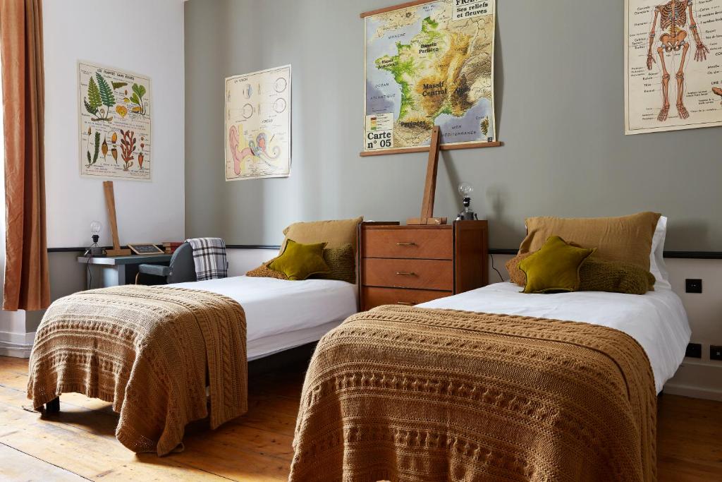 Postel nebo postele na pokoji v ubytování Le Boutik Hotel