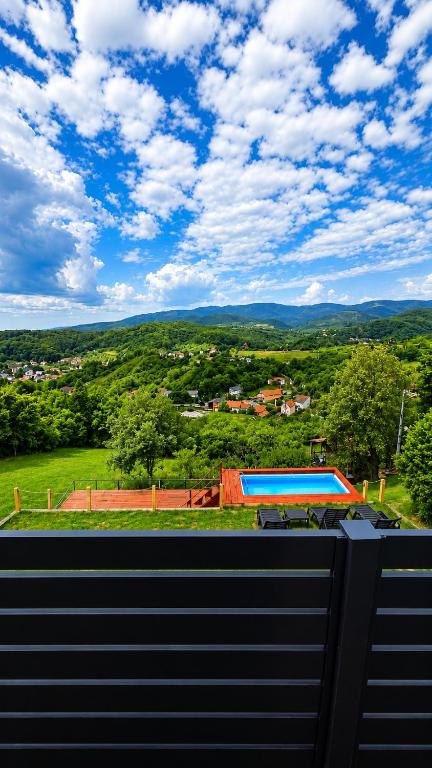 a view of a swimming pool from a house at Top Hill in Zagreb