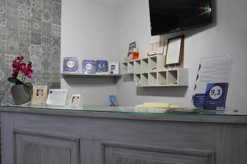 TV a/nebo společenská místnost v ubytování Bed and Breakfast Conte Luna