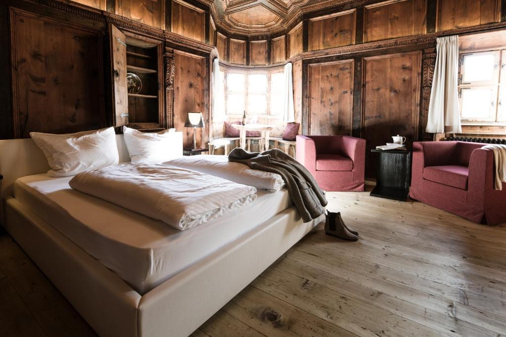 Postel nebo postele na pokoji v ubytování Hotel Weisses Kreuz