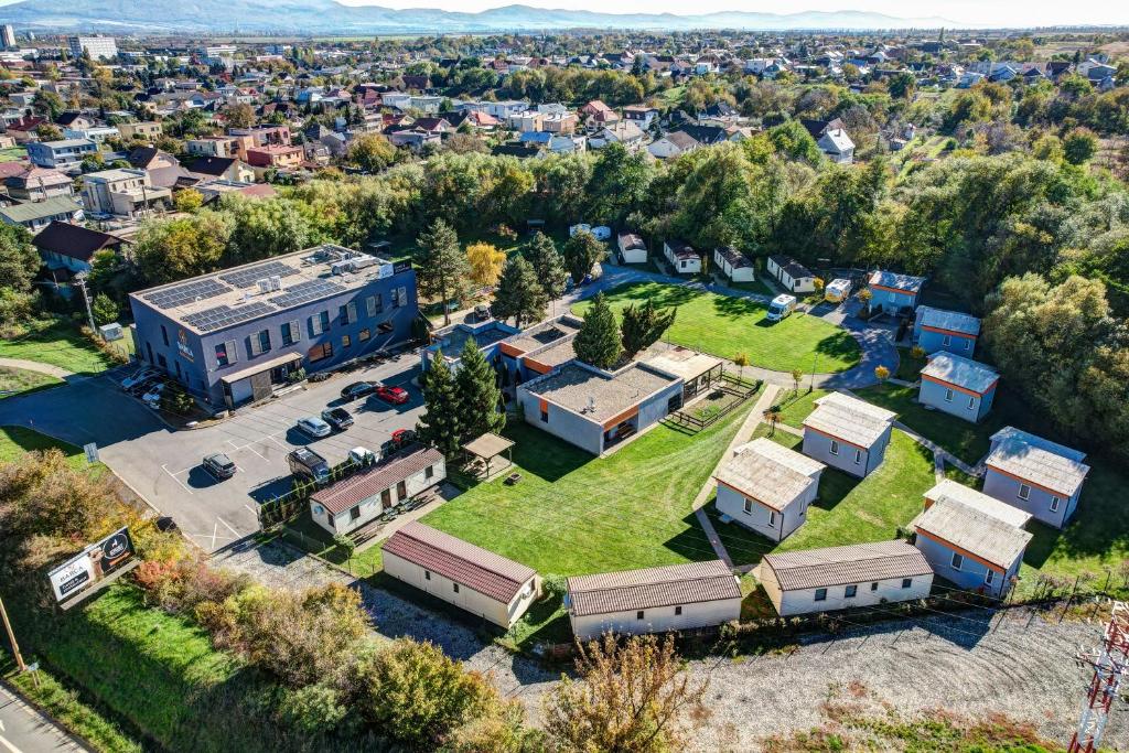 an aerial view of a building with a yard at Holiday houses BARCA in Košice