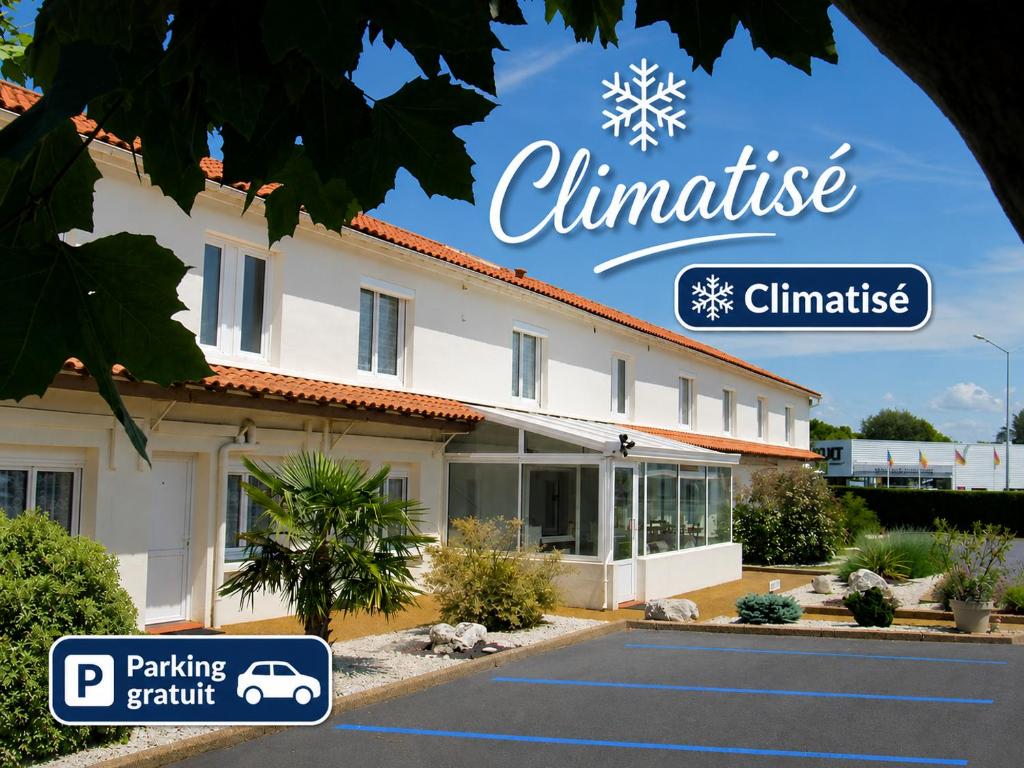 a building with a sign for the clubhouse at Cit'Hotel Les Atlantes Royan parking privé in Médis