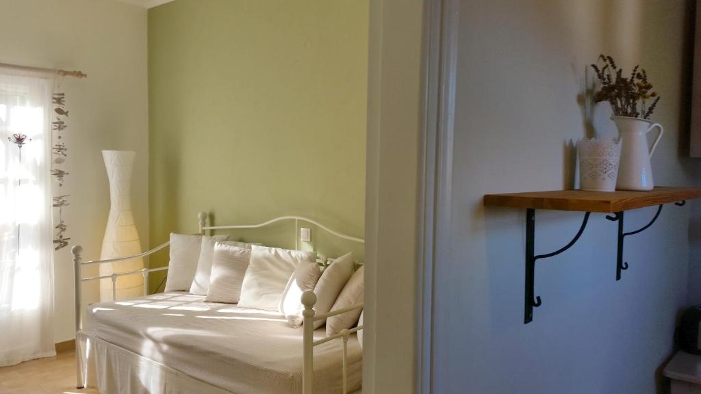 Postel nebo postele na pokoji v ubytování Kapella Apartments