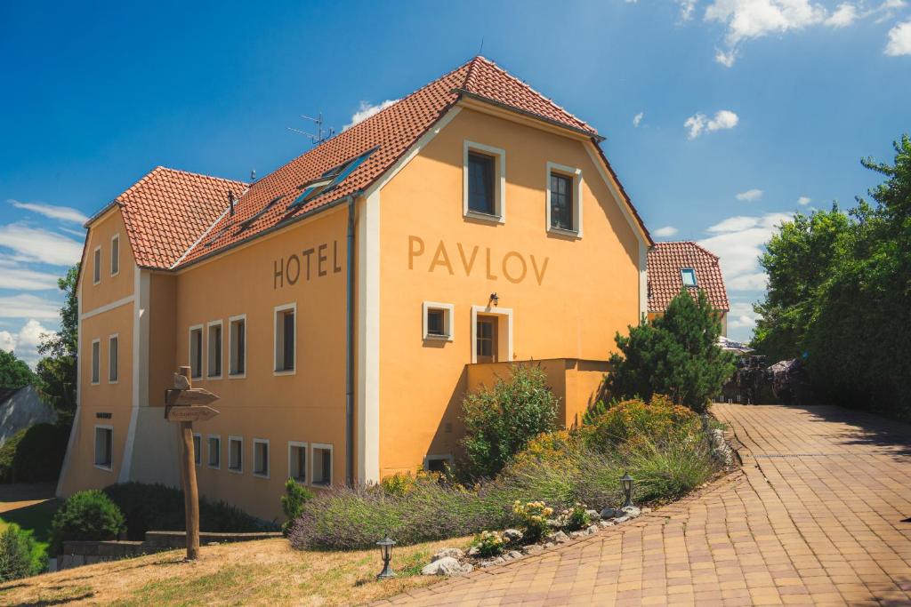a building with the words payolon written on it at Hotel Pavlov in Pavlov