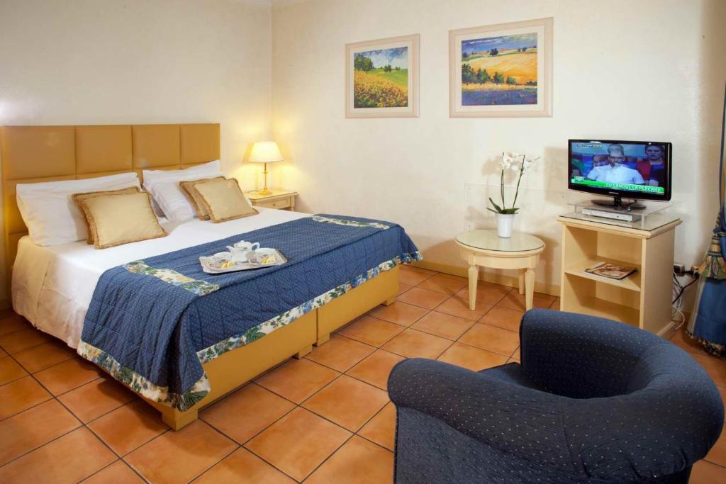 Uma cama ou camas num quarto em Hotel Piccolo Borgo