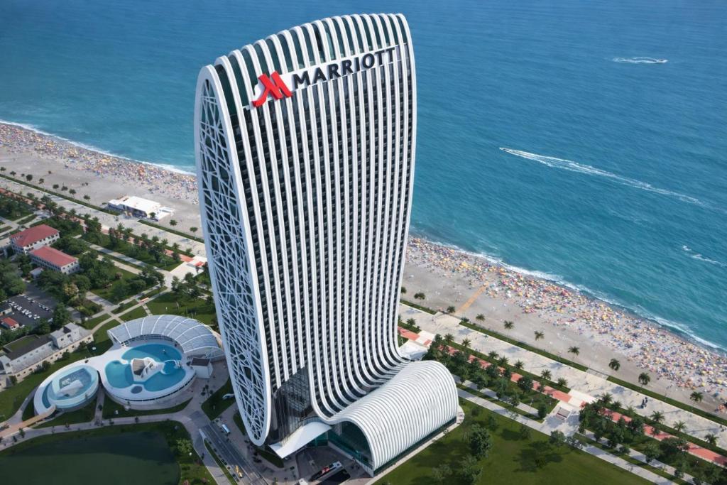 an aerial view of the mandarin oriental hotel on the beach at Skyline Privilege in Marriott in Batumi