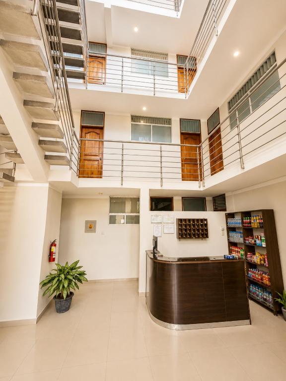an empty lobby of a store with a pharmacy at La Posada Del Pajarito in Yurimaguas