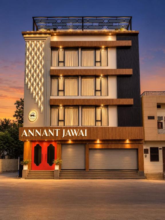 a large building with a sign on the front of it at Hotel Annant Jawai in Sheoganj