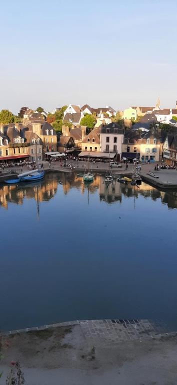 a view of a harbor with boats in the water at Chambre d'hôtes Thé ou Café in Auray