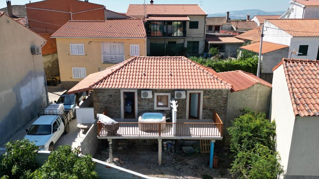 an aerial view of a house in a city at A casa do Avô Cruzes in Cerejais