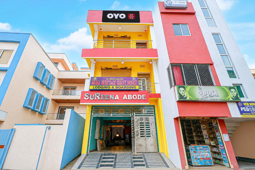 a building with a sunwegianovo sign in front of it at Hotel O Muna Heritage Guest House in Cuttack