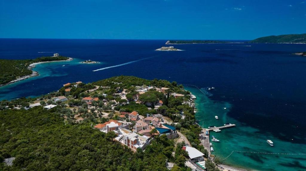 an aerial view of a small island in the water at MiraMare in Luštica
