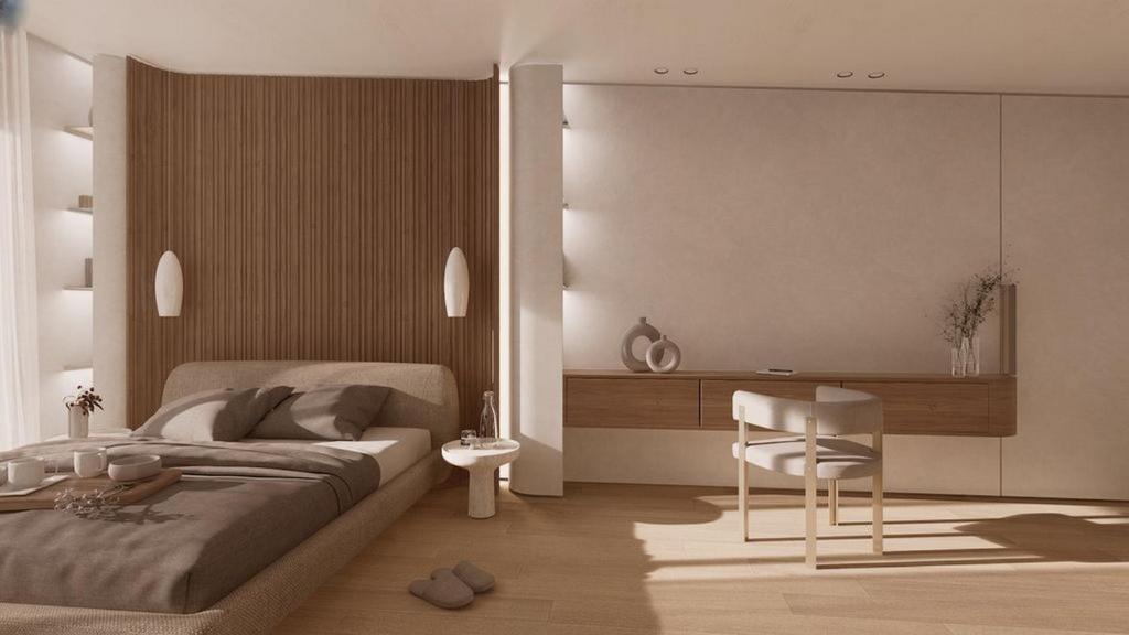 a bedroom with a bed and a chair in it at Lisavet Skala Kefalonia - Emerald Home Beachfront in Valsamáta