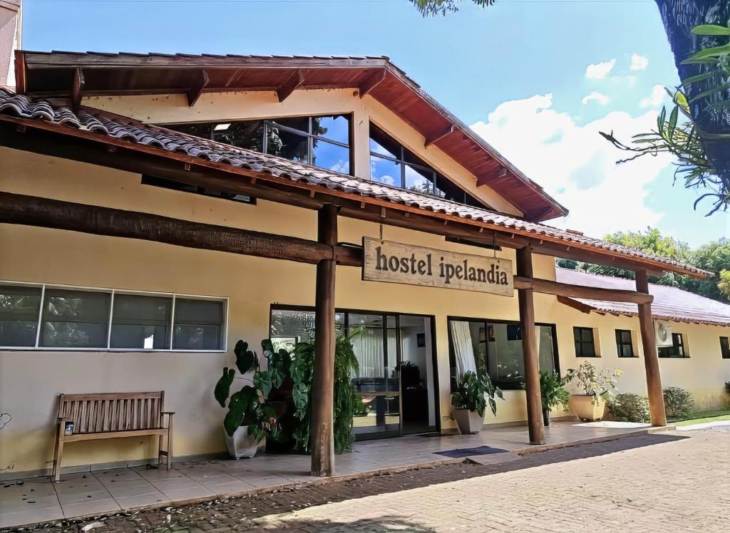 a building with a sign that reads hostel hyannis at Park Golf Hostel Ipelandia in Foz do Iguaçu