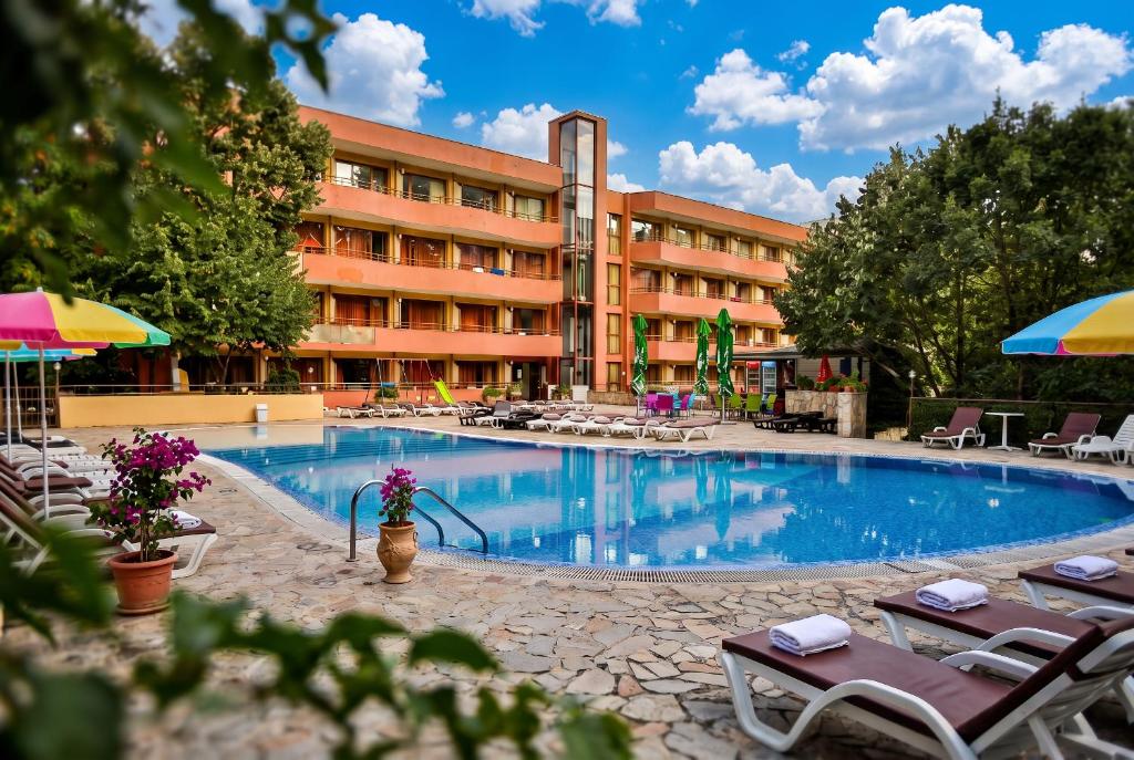 a large swimming pool in front of a hotel at Kamchia Park Hotel - All Inclusive in Golden Sands