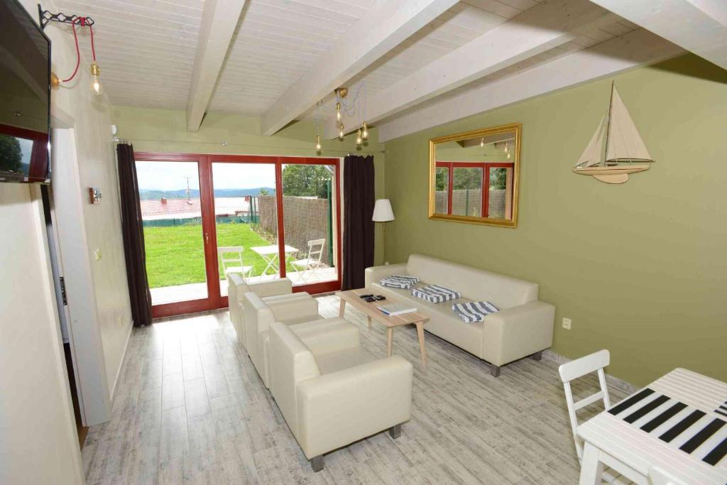 Posezení v ubytování Apartmány Modřínový Dům
