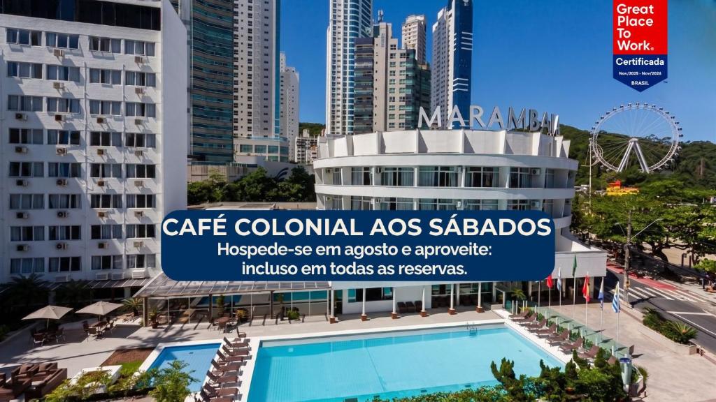 a sign for the cate colossus las sacionos hotel at Marambaia Hotel e Convenções in Balneário Camboriú