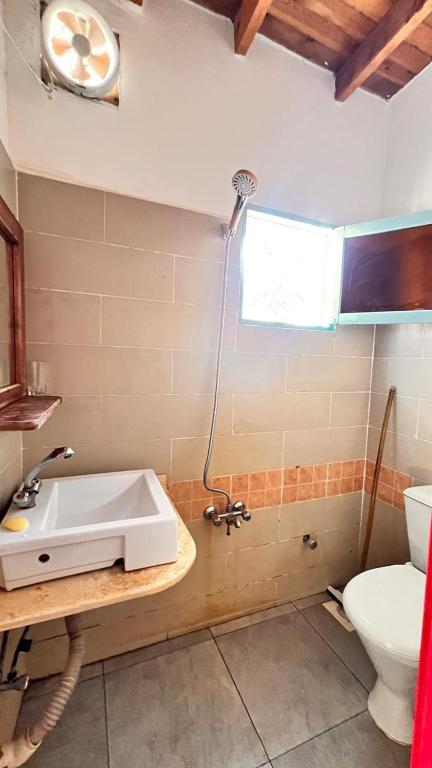 a bathroom with a sink and a shower at Wanasa house in Dahab