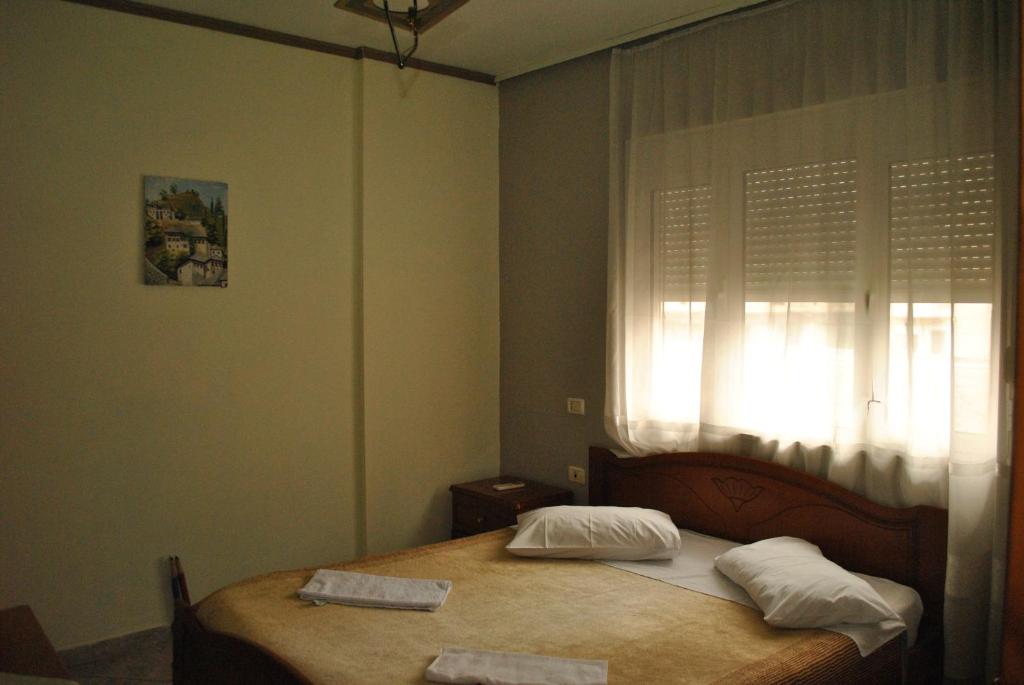 Postel nebo postele na pokoji v ubytování Eden Hotel