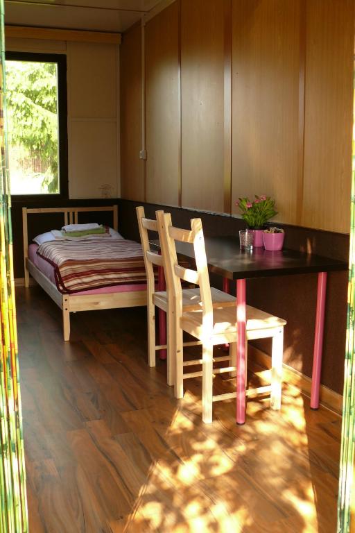 Postel nebo postele na pokoji v ubytování Camp Alpa