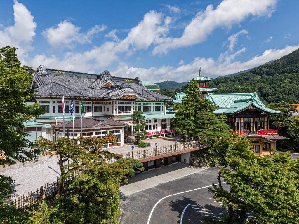an overhead view of a large building with trees at The Fujiya Hotel in Hakone