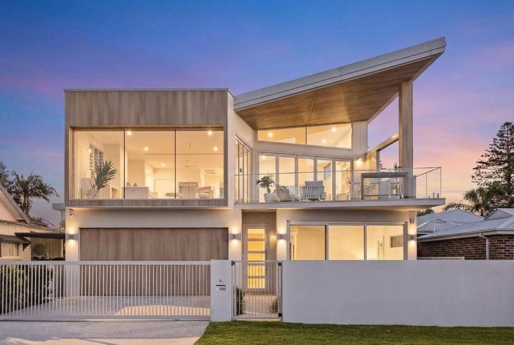 an image of a house with glass windows at The Grand Ocean Vista in Shellharbour
