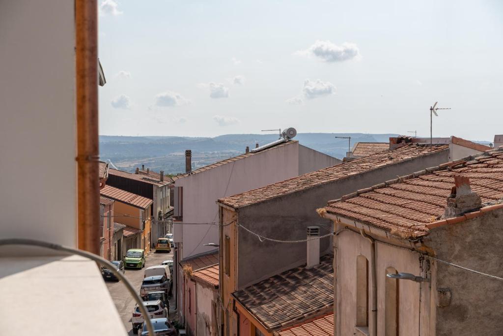 an overhead view of a city street with buildings at Tia Maria - Tradizione e Autenticità in Ploaghe
