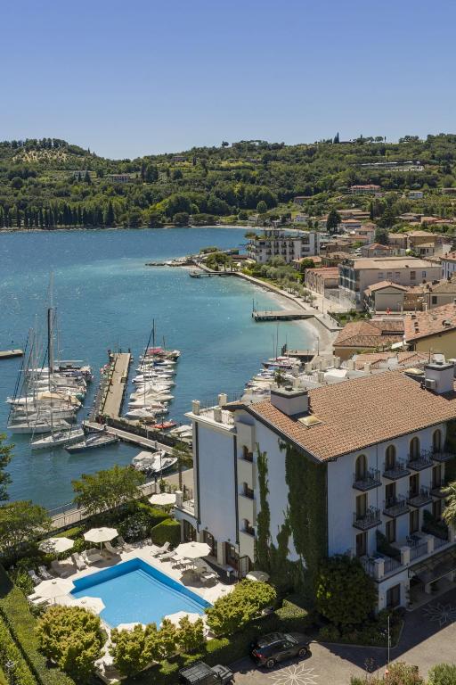 an aerial view of a harbor with boats in the water at Bellerive Lifestyle Hotel in Salò