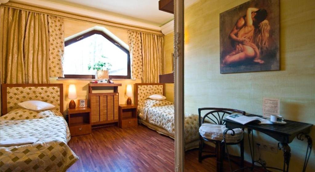 Posteľ alebo postele v izbe v ubytovaní Manor House SPA Luxury of Silence