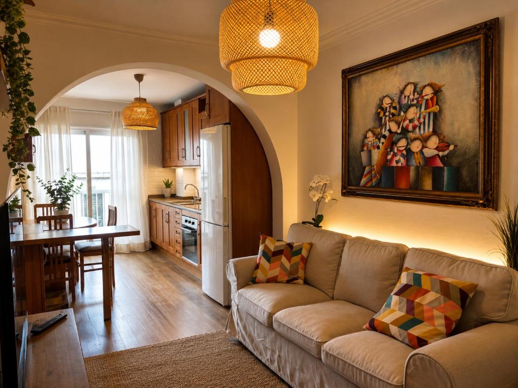 a living room with a couch and a kitchen at VV Vista a Teno in Buenavista del Norte