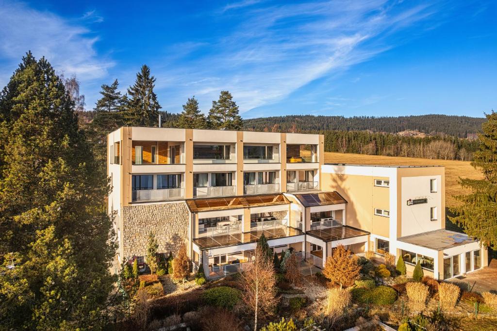 an aerial view of a building at Apartmány Star Lipno - Self Check-in in Lipno nad Vltavou