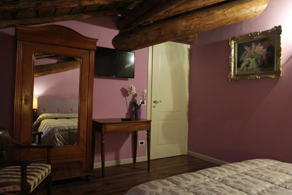 Postel nebo postele na pokoji v ubytování Relais Corte Sant' Agata B&B