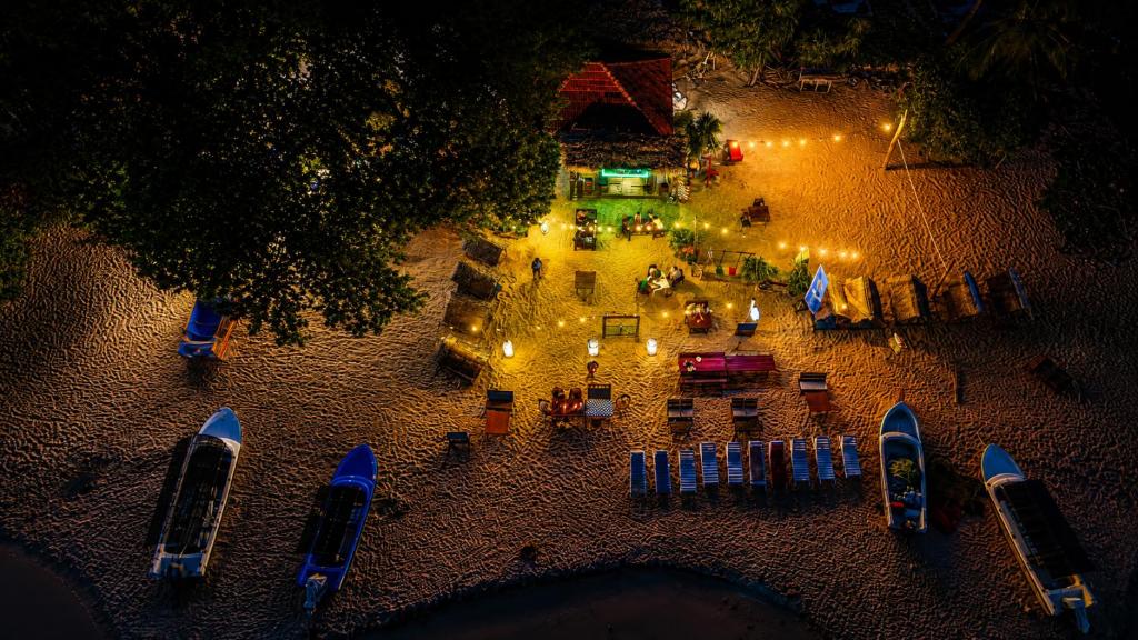 an overhead view of a restaurant at night with lights at Nilaveli Sheen Coast in Trincomalee