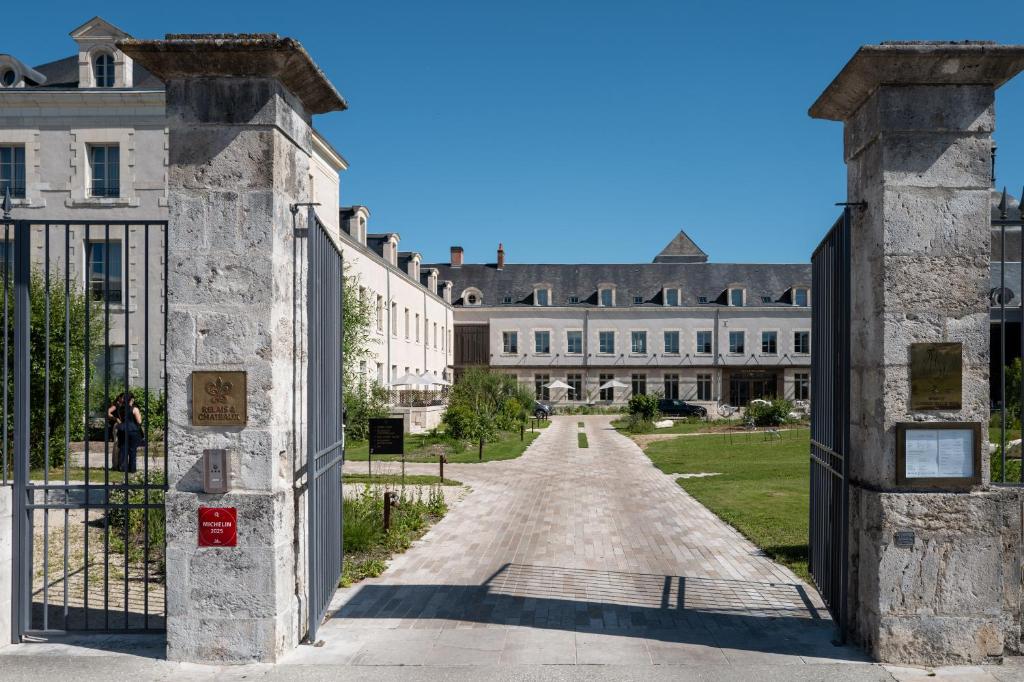 an entrance to a building with a gate at Fleur de Loire in Blois