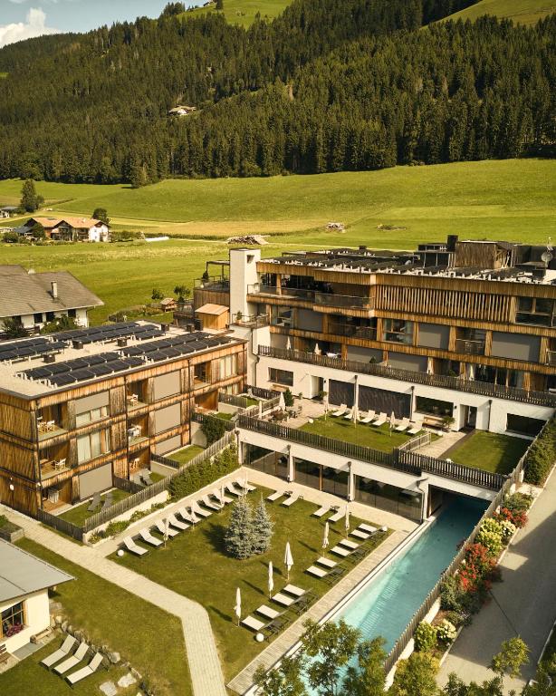 an aerial view of a resort with a swimming pool at Hirben Naturlaub in Villabassa