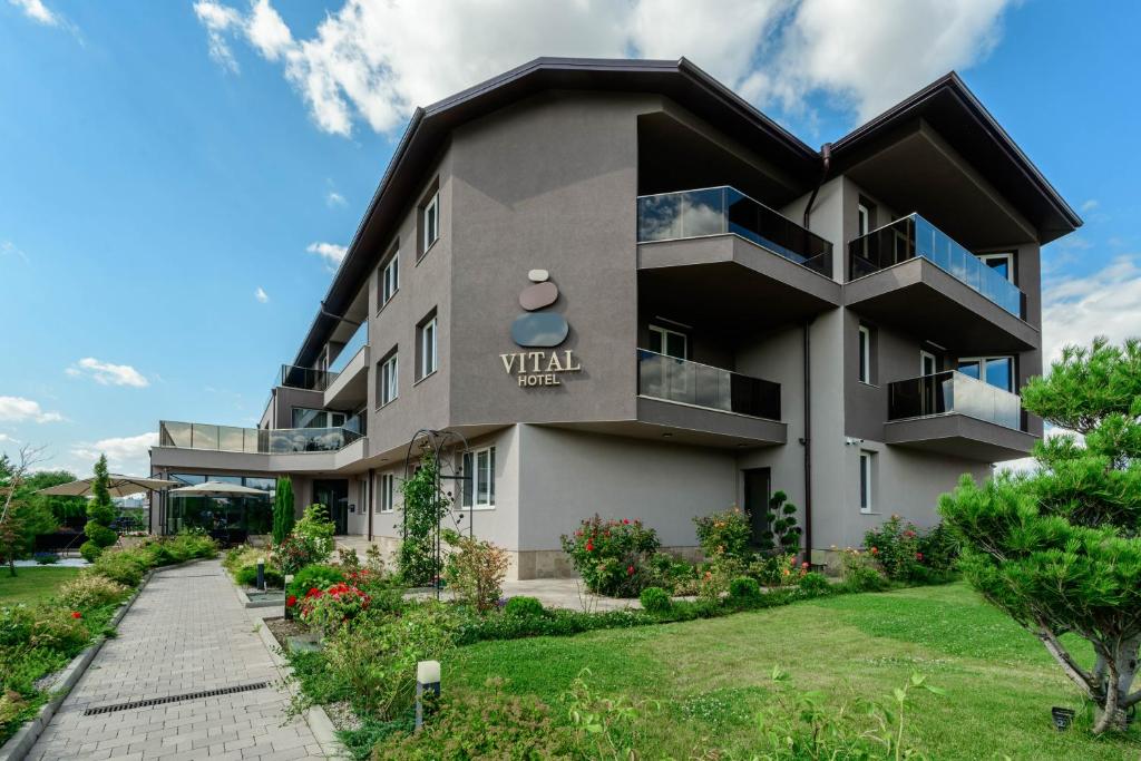 a building with a villa sign on it at Vital Hotel in Sofia