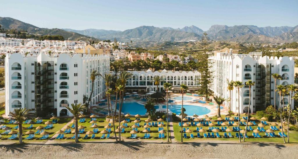 an aerial view of a resort with a pool at Ona Marinas de Nerja Spa Resort in Nerja