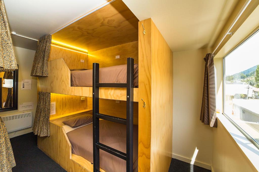 Postel nebo postele na pokoji v ubytování Tahuna Pod Hostel