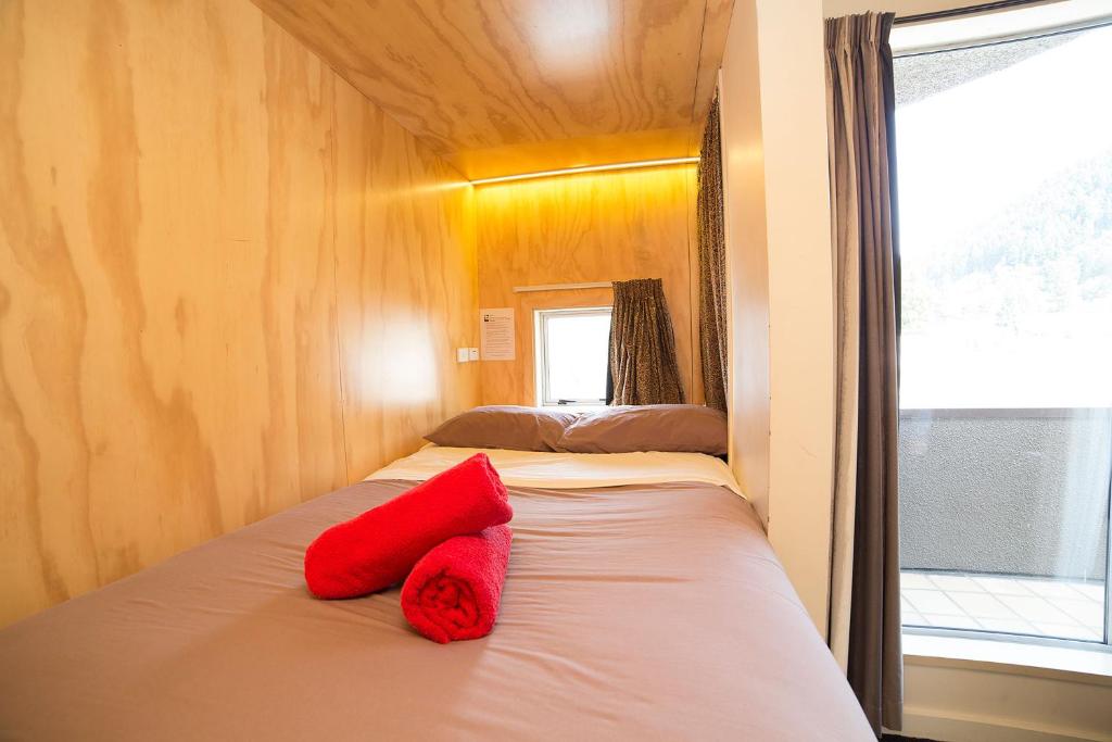 Postel nebo postele na pokoji v ubytování Tahuna Pod Hostel