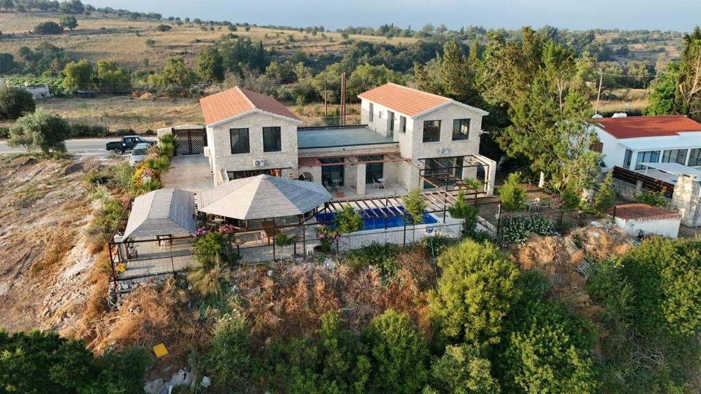 an aerial view of a house on a hill at LasaThea in Lasa