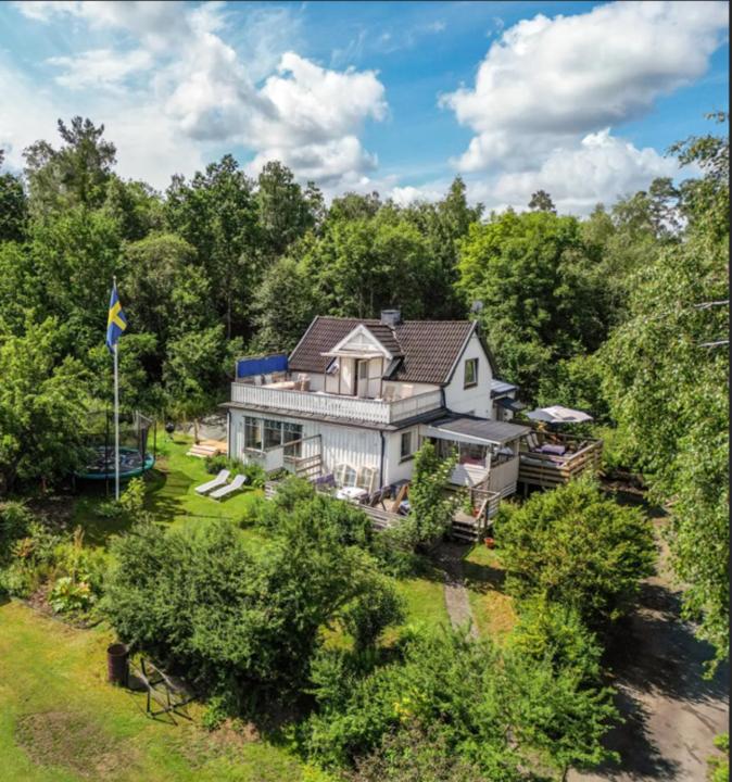 an aerial view of a house in the woods at Haby House Old in Skene