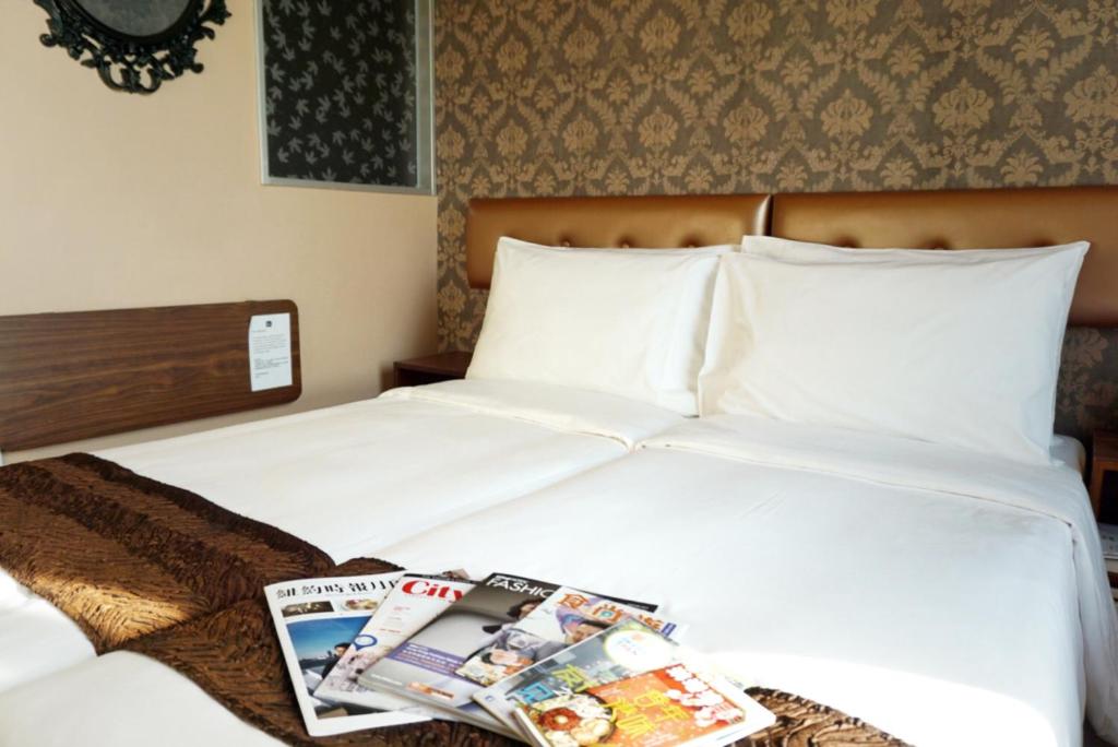 Postel nebo postele na pokoji v ubytování Best Western Hotel Causeway Bay