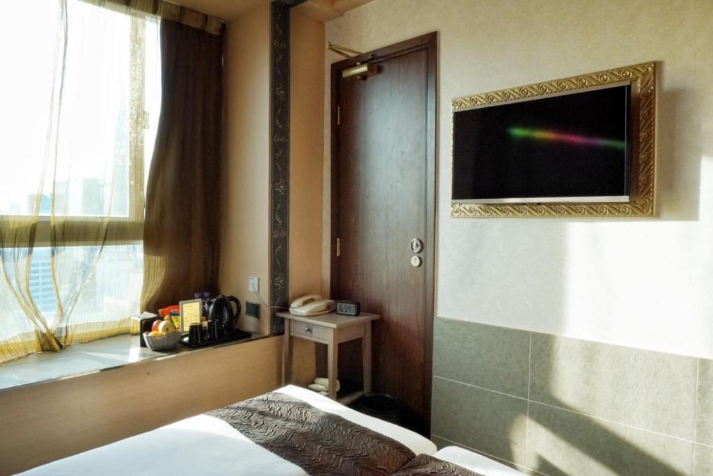 TV a/nebo společenská místnost v ubytování Best Western Hotel Causeway Bay