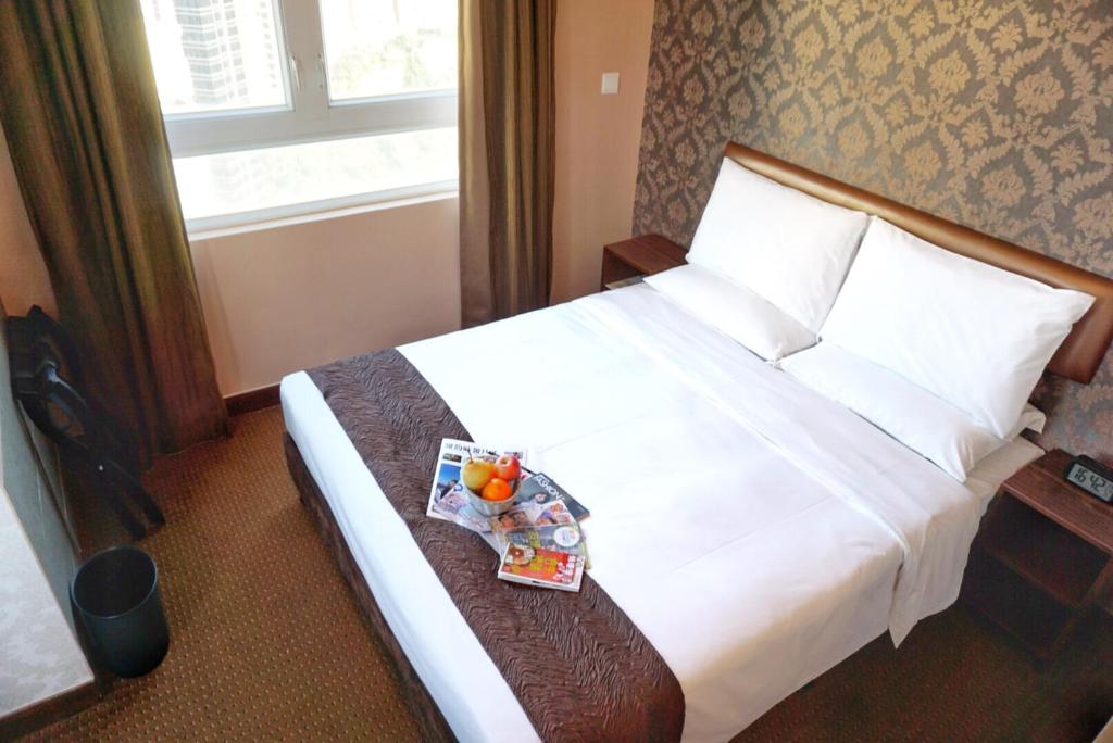 Postel nebo postele na pokoji v ubytování Best Western Hotel Causeway Bay